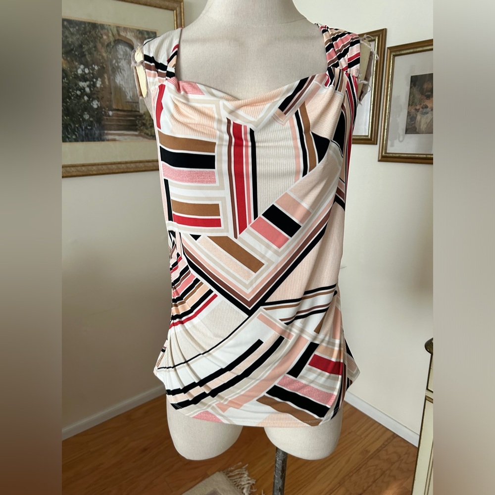 White House Black Market almost new abstract print top size M. C:4089-5 7/30/26